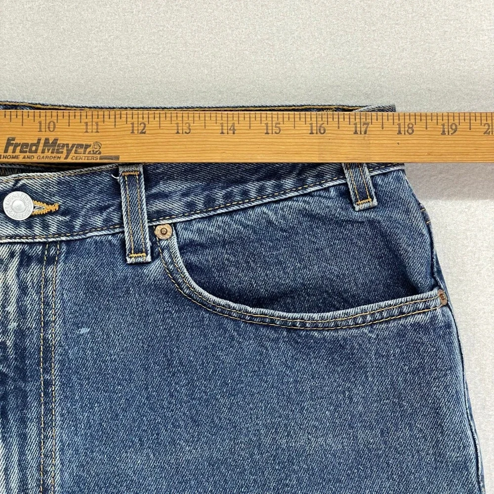 VTG Levi's Jeans 550 Mens 38x32‎ Blue Distressed Denim Relaxed made in USA Cut
